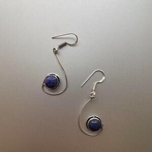 Elegant Sterling silver drop earrings featuring a deep Lapis lazuli stone